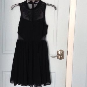 Black skater dress with embroidered detailing